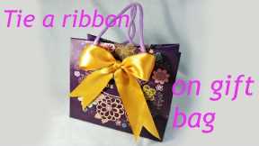 How to make a bow | ribbon bow | bow making | tie a ribbon on gift bag #giftbag