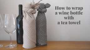 How to wrap a wine bottle with a tea towel (kitchen towel/dish towel) - reusable gift wrapping idea!