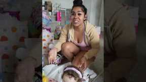 Mom and dad help daughter open her birthday gifts #shorts